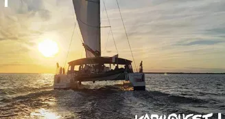 Sortie à l'heure du coucher de soleil en catamaran à voile - Kapalouest Sortie à l'heure du coucher de soleil en catamaran à voile - Kapalouest